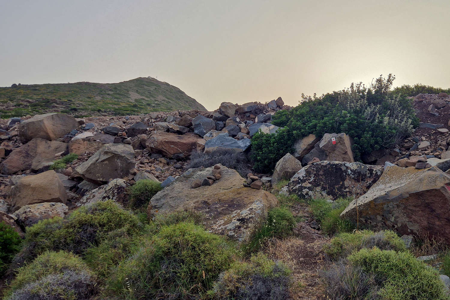 The top section of the ravine, Hellanio summit visible.