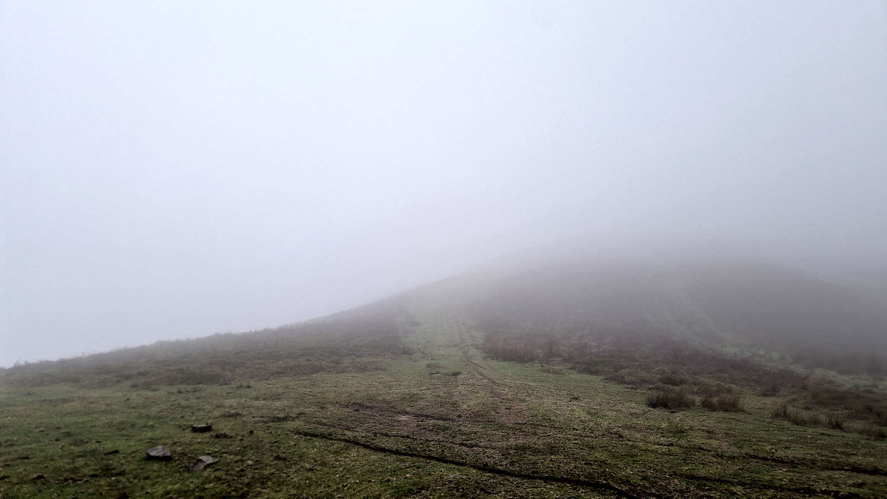 Above the steeper section.