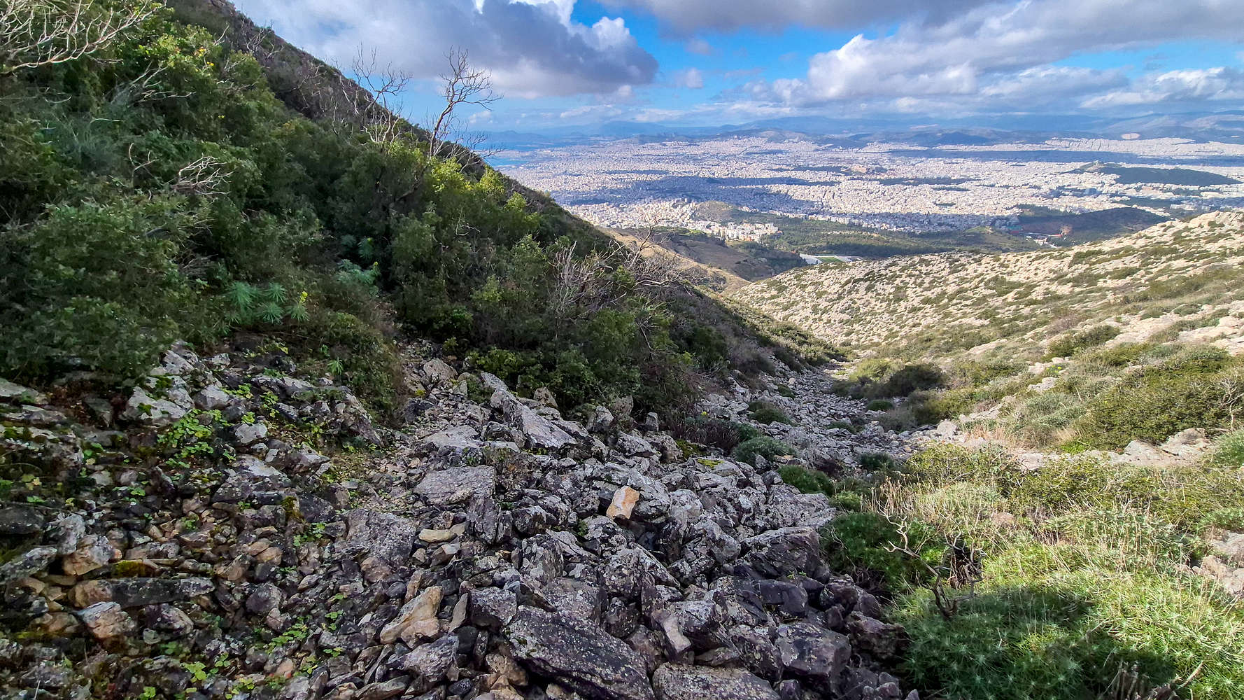 Traversing the ravine with views of Athens.