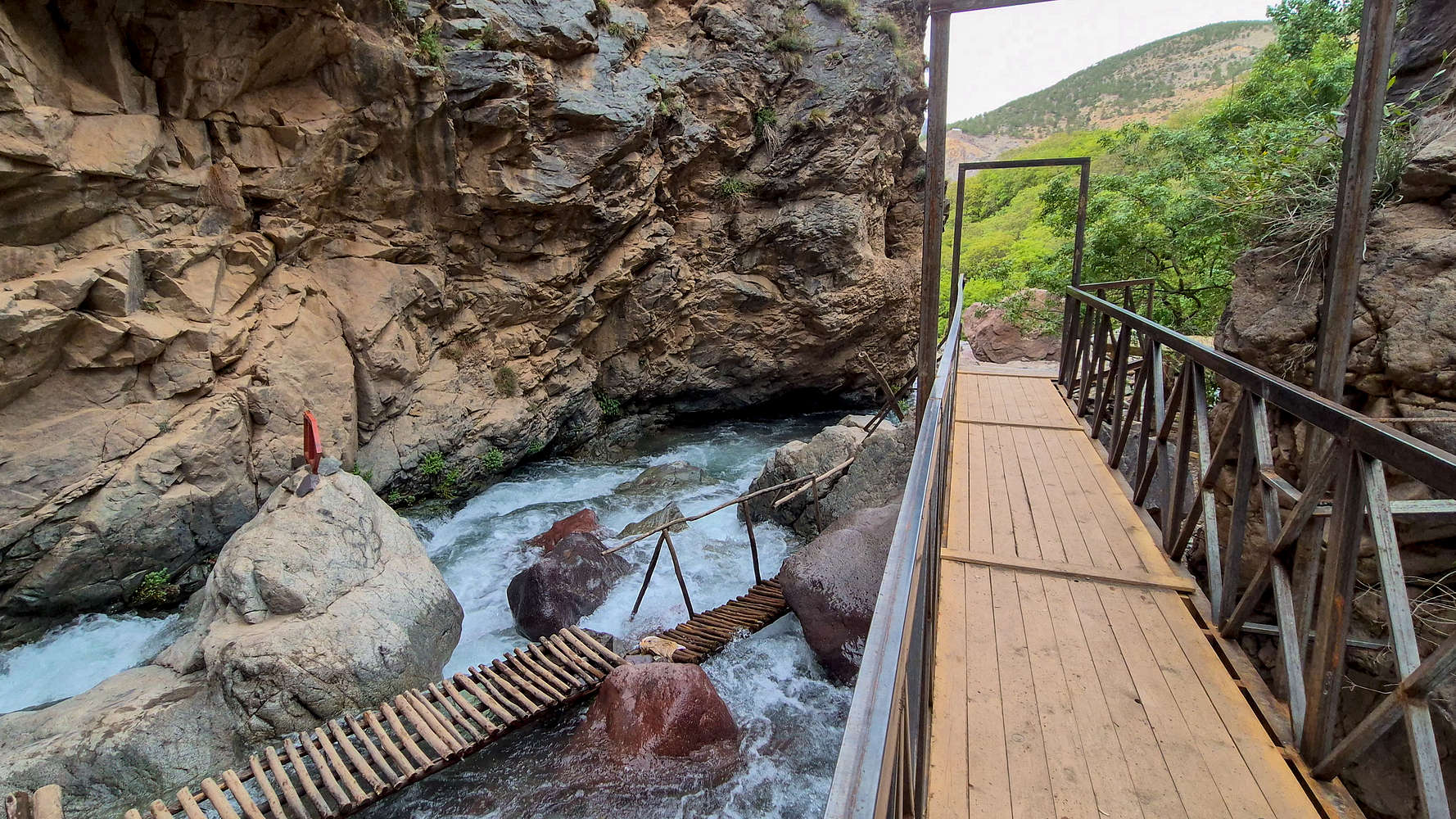 The new (right) and old (below) bridge for Imlil waterfalls.