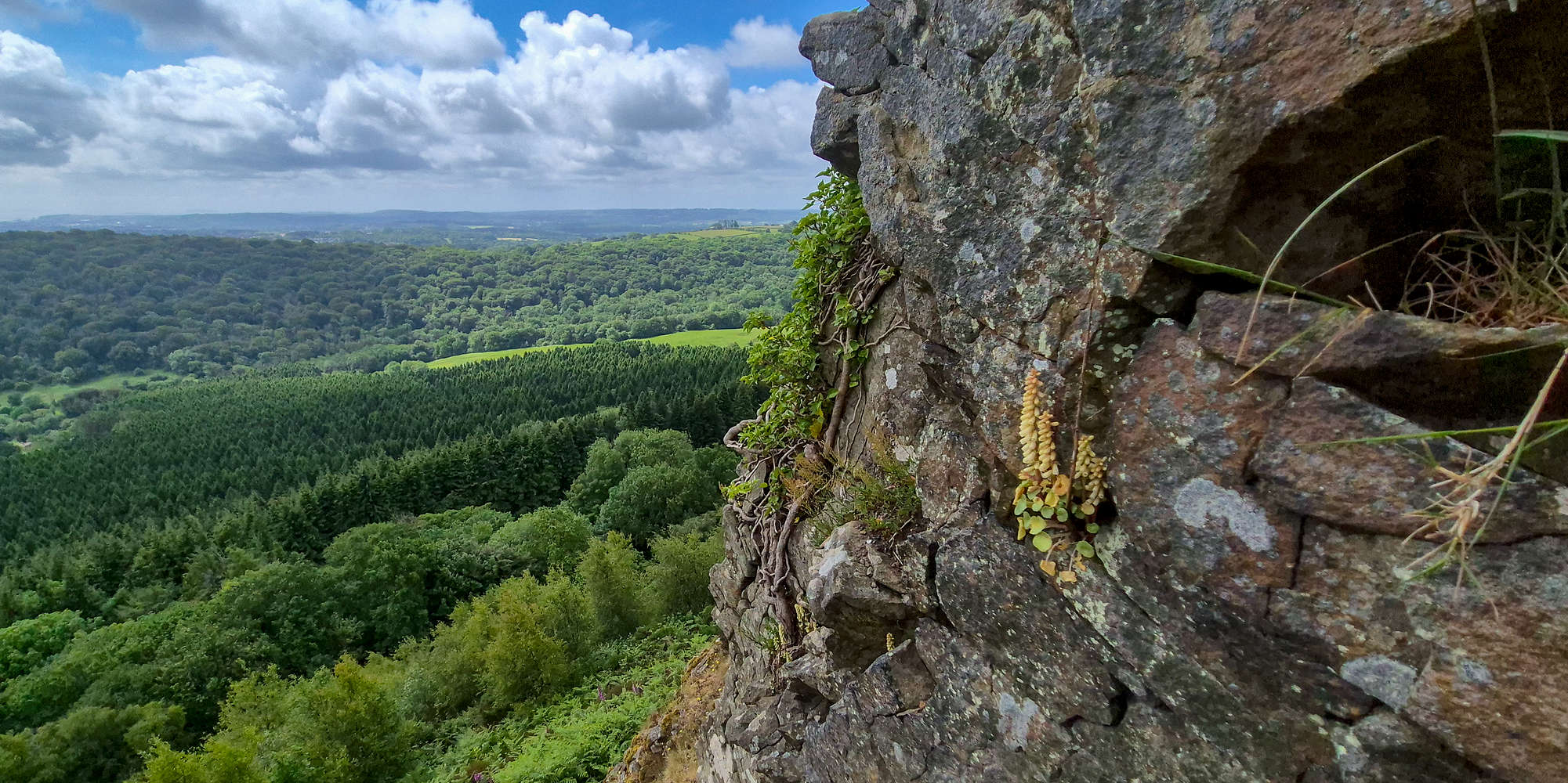 Airy position while climbing The Notch on The Garth (307m).