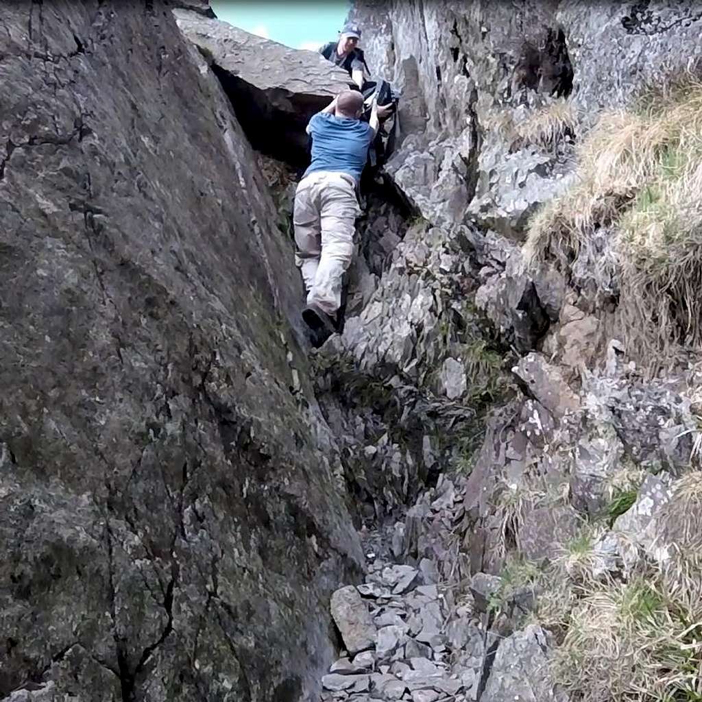 Climbing crux pitch in mid section of Jacks Rake