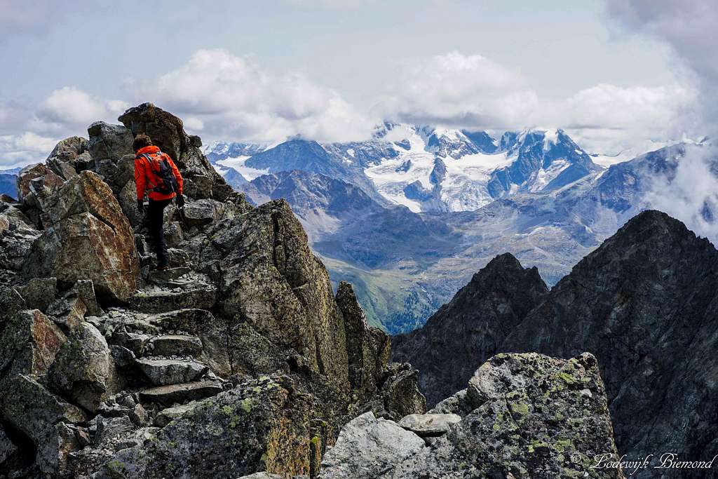 Maarten on the ridge; Bernina Group behind