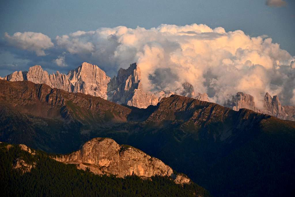 View to the Pale di San Martino group in evening light and cloud