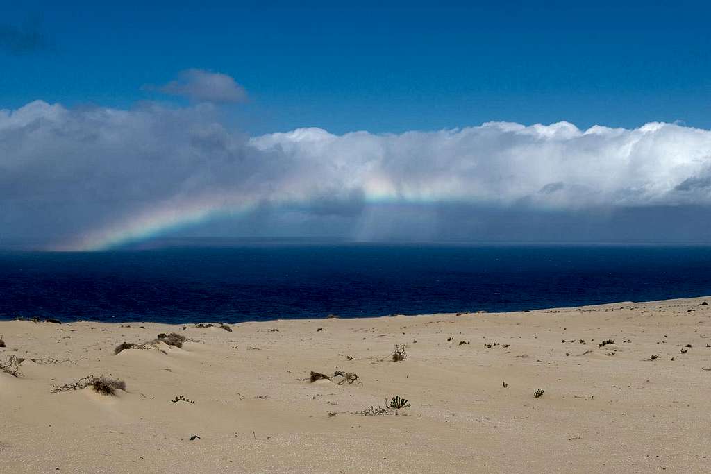 Sand, sea and a rainbow