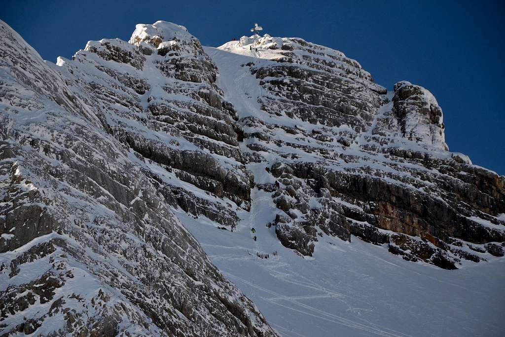 Climbers at the base of the gully leading to the summit of Hoher Dachstein