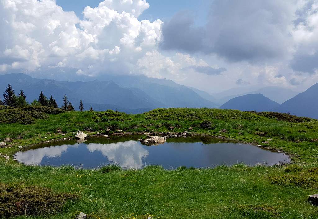 Small alpine pond on the route to Monte Cengledino