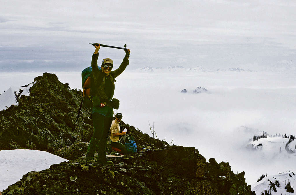 Summit celebration above the clouds
