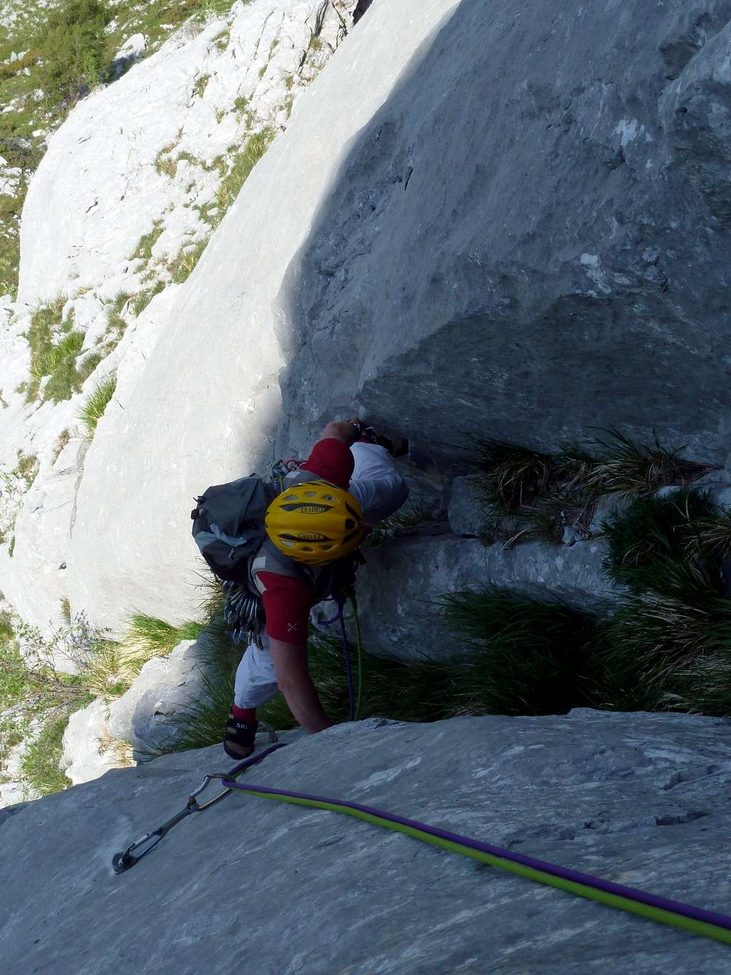Climbing a groove on Torre Francesca, route Maestri