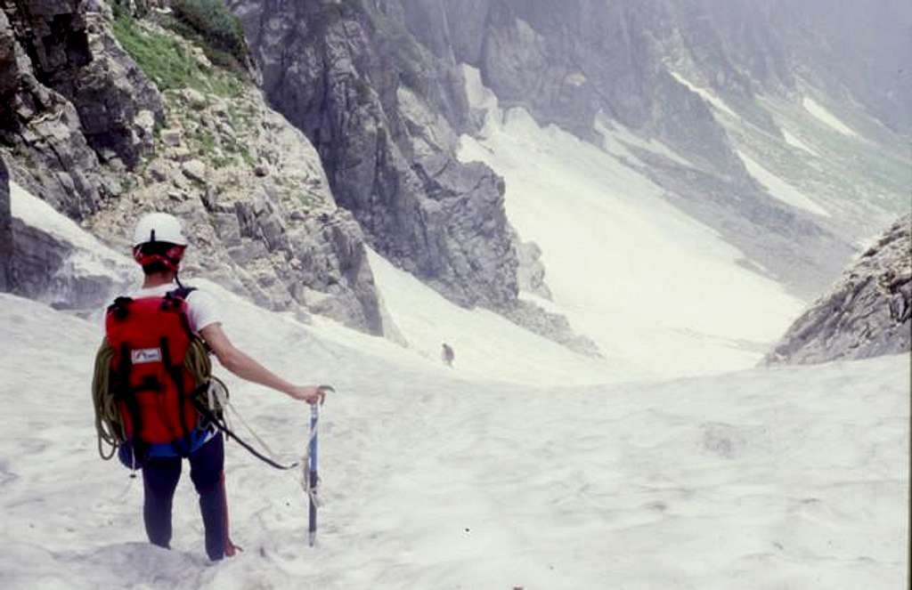 Climbing down a snow gorge...