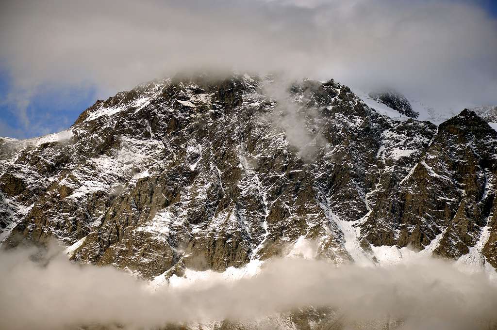 Cloudy Mont Velan with its horns, tooths & couloirs