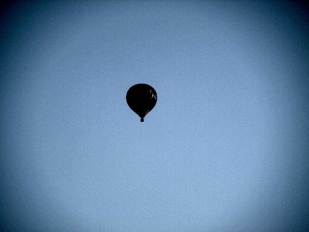 Autumn hot air balloons towards the Mont Velan Range