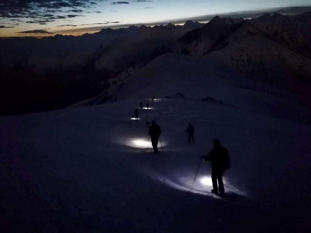 Winter moonlight ascent to Monte Soglio
