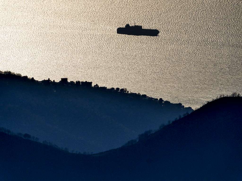 Zooming from Alpesisa on a ship in the Ligurian sea