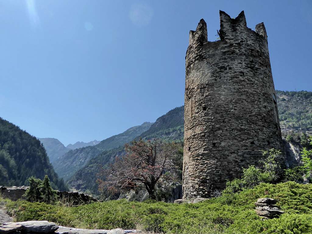 The tower of Montmayeur castle and Valgrisenche in background