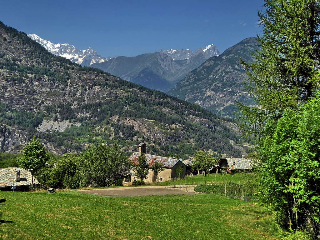 The village of Les Combes with Mont Blanc range in the background