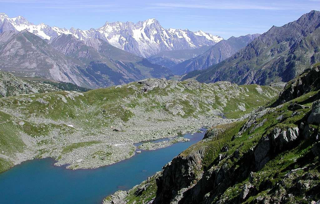 First lake of Bella Comba during the ascent to the Tachuy lakes, and Grandes Jorasses