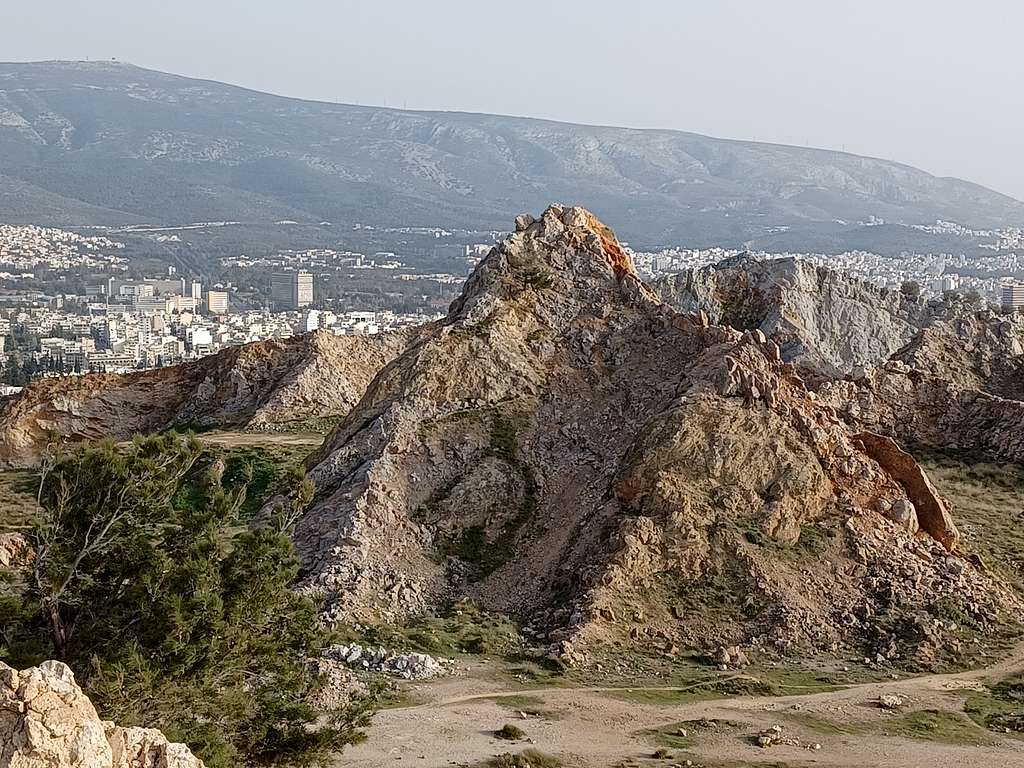 Outcrop tower photographed from the peak of Three Tree Rock
