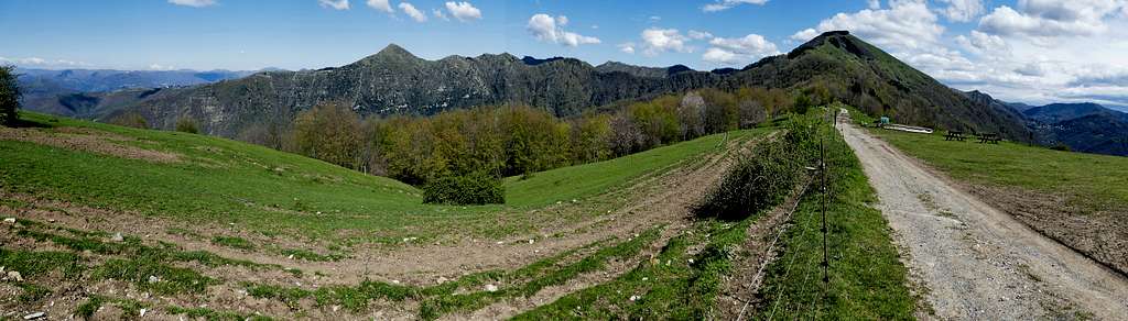 Pano view from Piani di Capenardo, including Alpesisa, monte Lago and Candelozzo