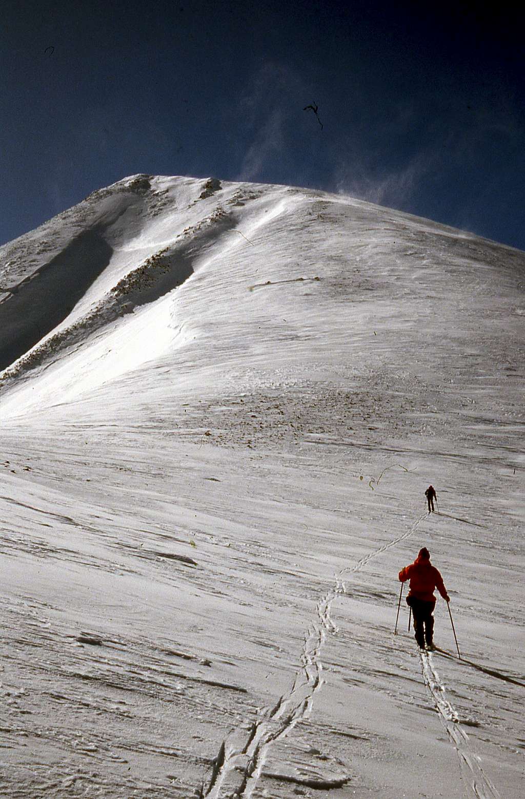 Armando Menocal and Rich Henke skiing up Arc Dome in 1995