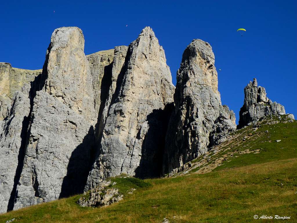 Paragliding over Sella Towers (seen from West)