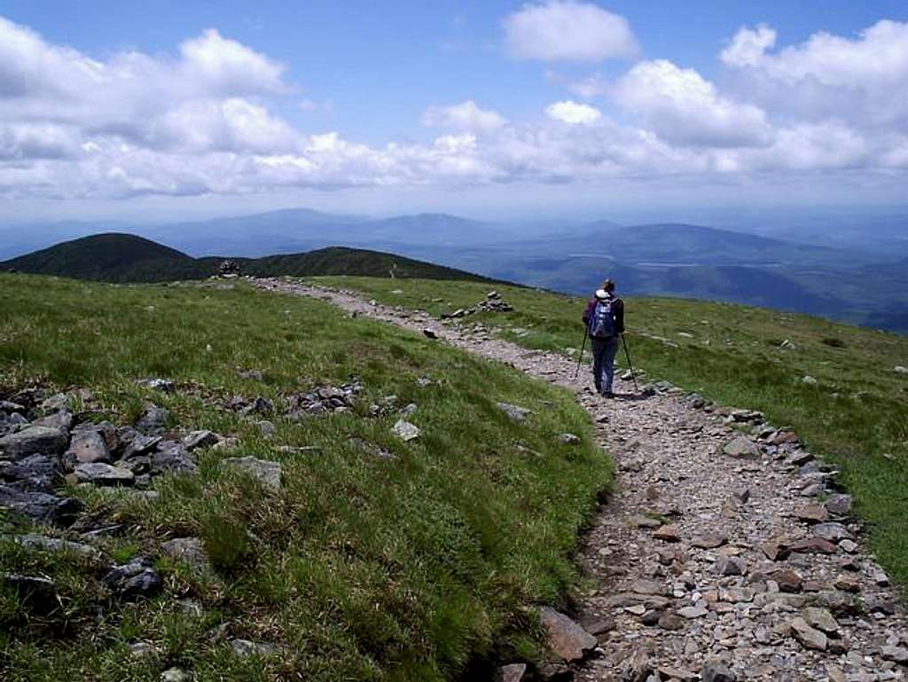 Strolling over the summit on a gorgeous day in the mountains