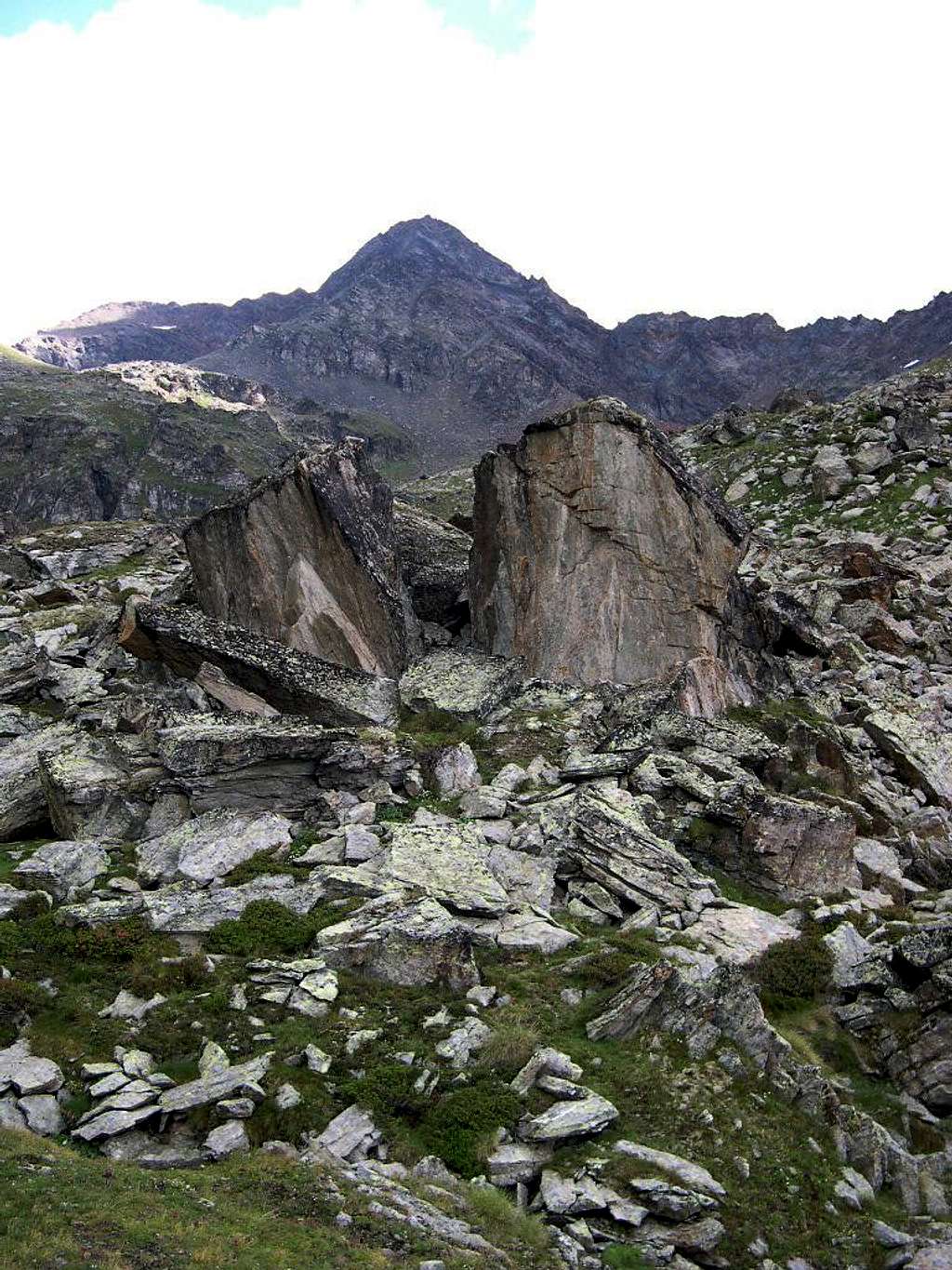 Characteristic boulders at the head of Vallone di Arpisson in front of Punta Garin <i>(3448 m)</i>