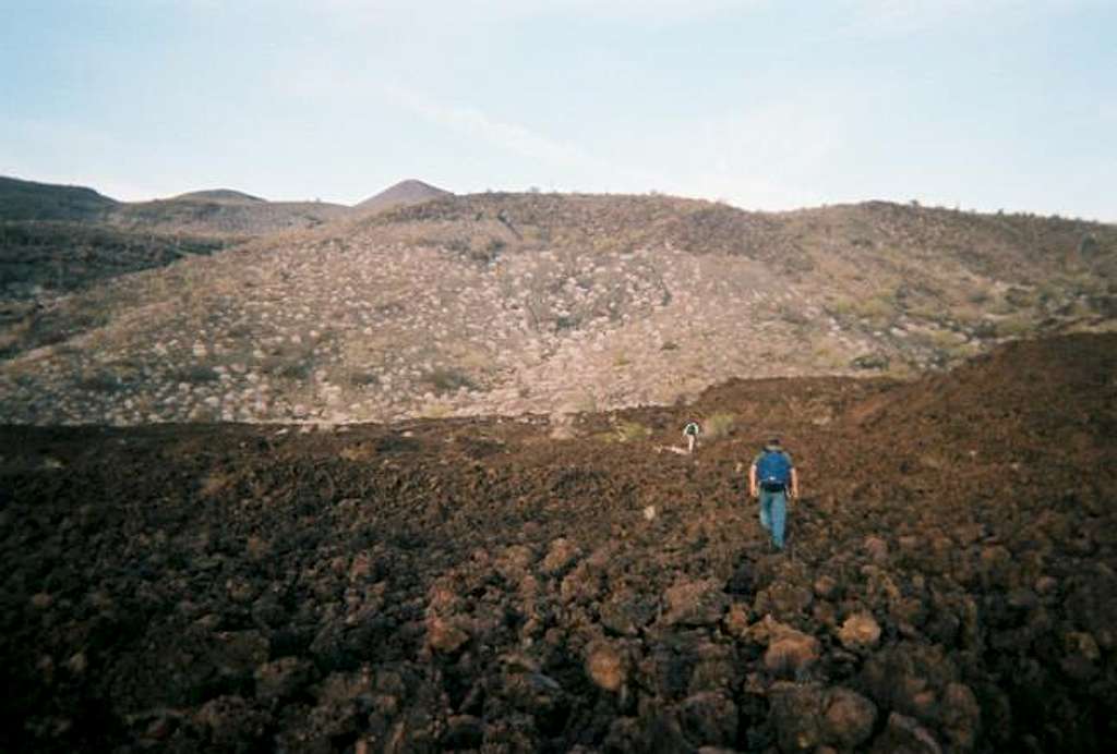 Walking across a lava field.