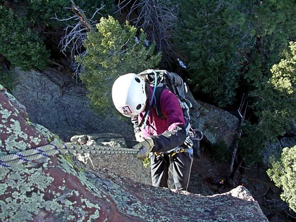 Kristin rappels from the Summit
