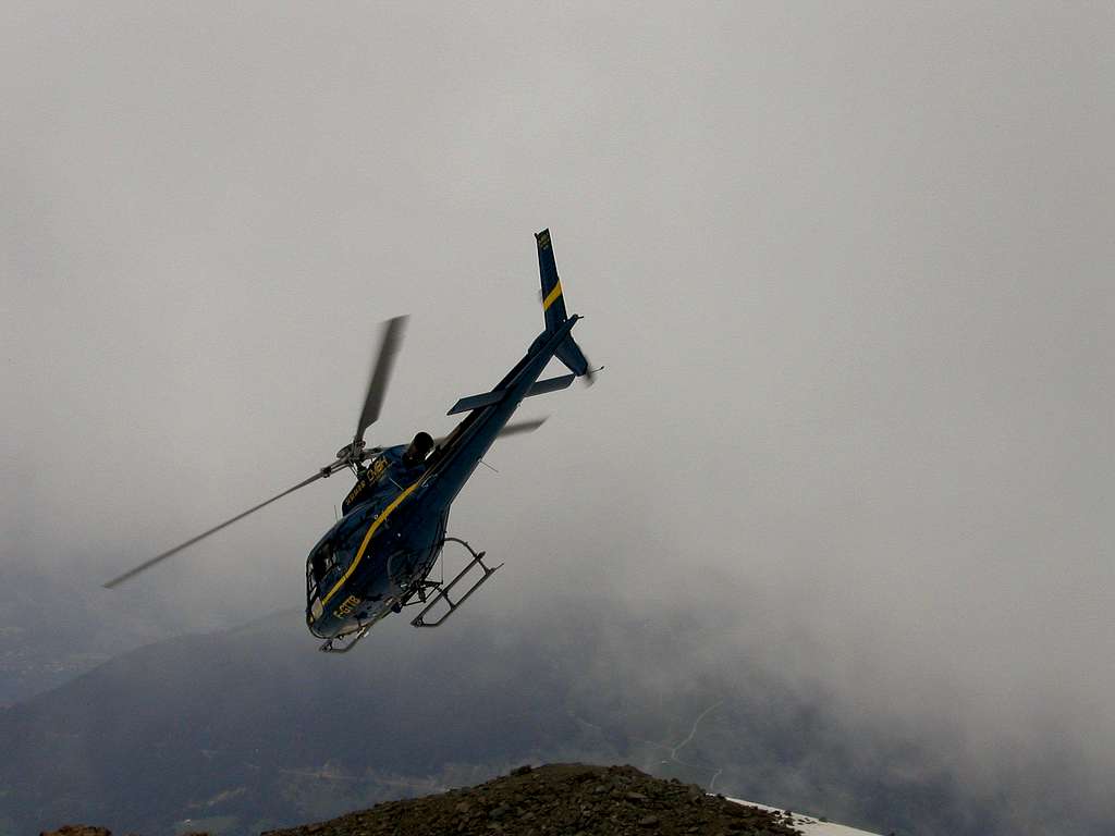 Helicopter below Mont Blanc on Gouter