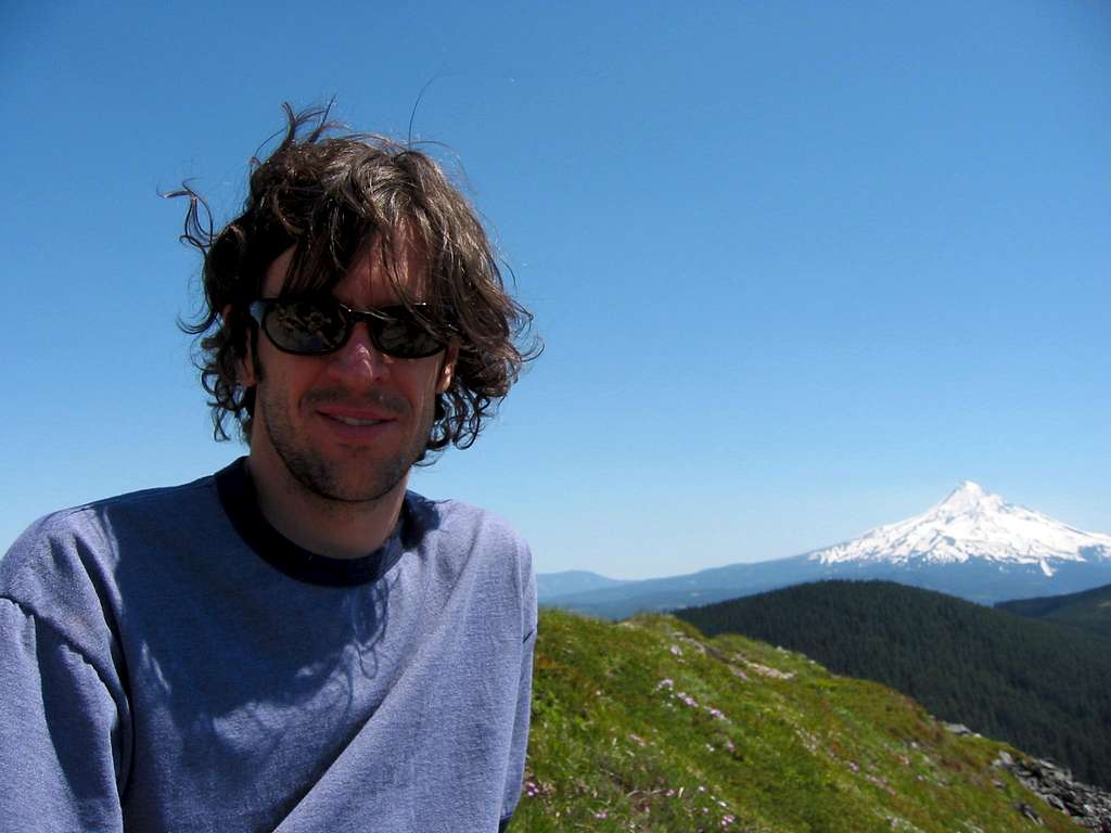Jason at the summit of Chinidere Mt. with view of Mt. Hood