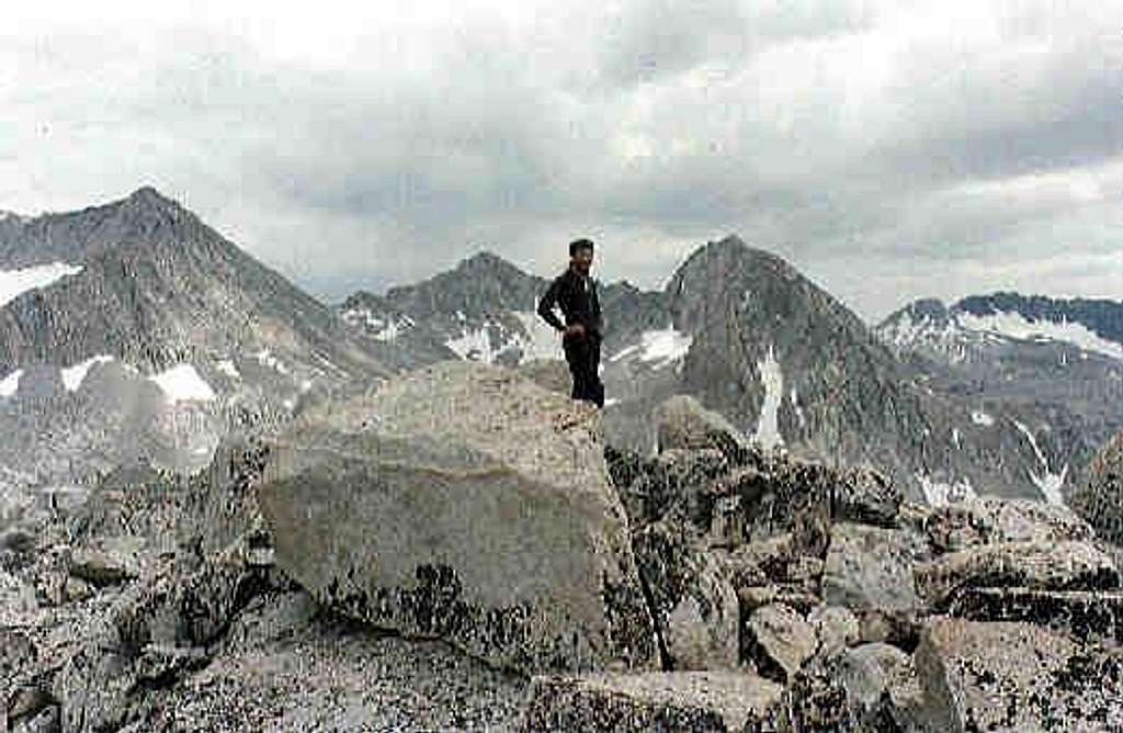 Tom standing on the summit of...