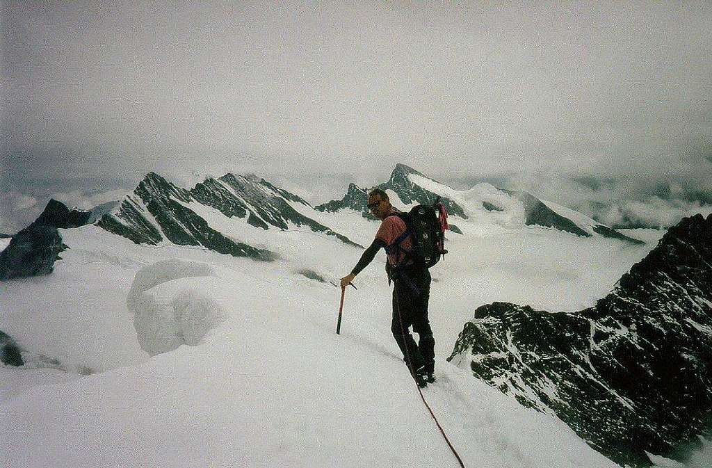 On the summit ridge of the Mönch on a cloudy day (1990). 4099 meters in those days