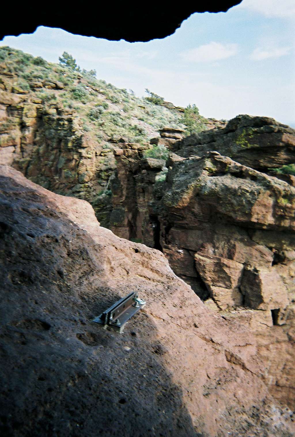 Tyrolean Traverse anchors in mouth cave
