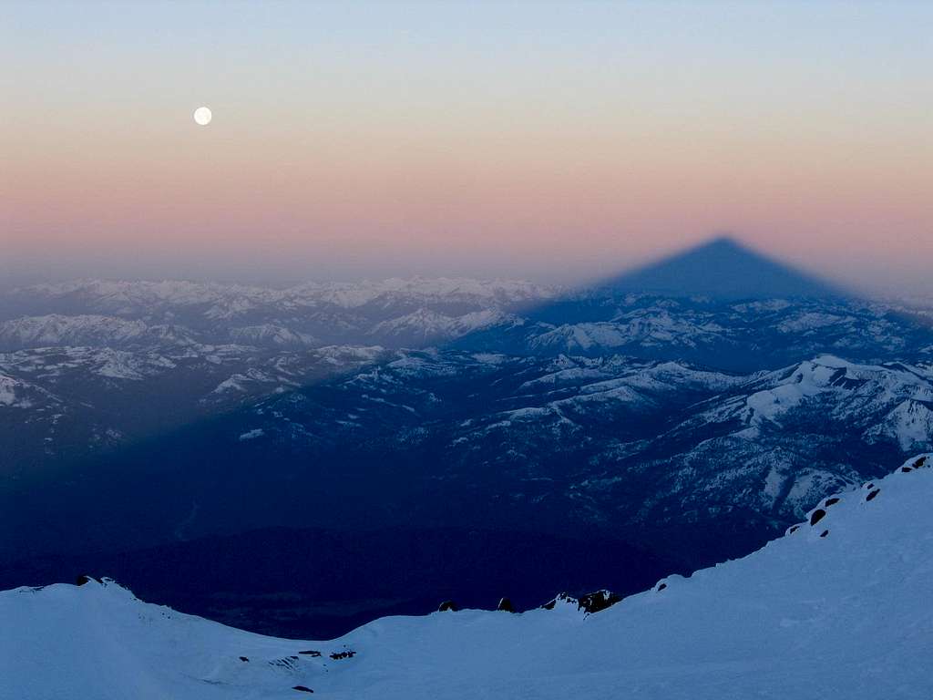 Shasta's shadow at sunrise from near 14k (with moon)