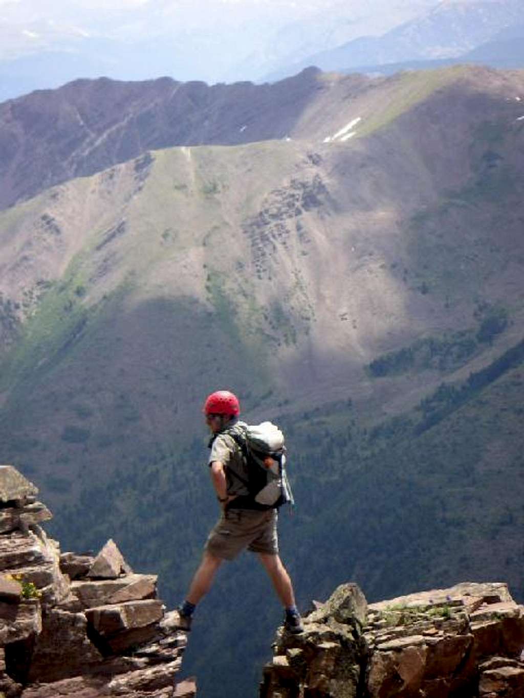 Jesse Hill descending Pyramid Peak's Northeast Ridge/East Face.  July 15, 2006.