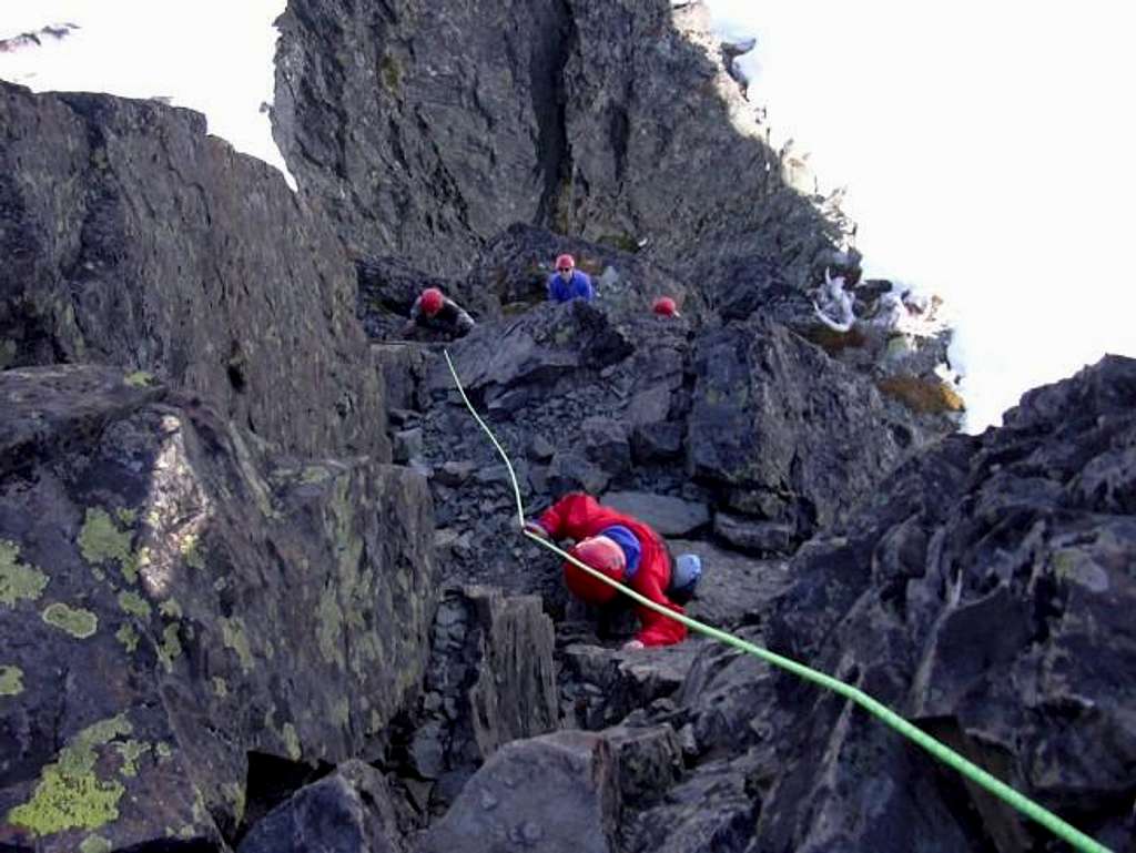 Climbers ascending a fixed...