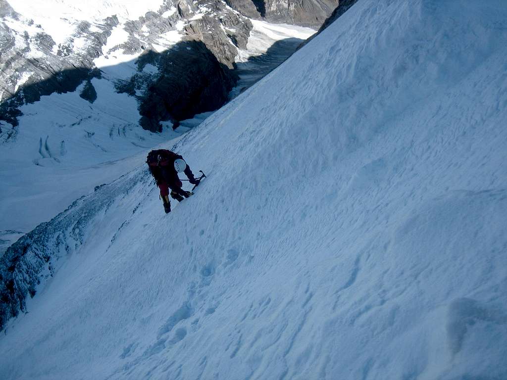 Climbing aside a runnel on the west face of Mt Lefroy