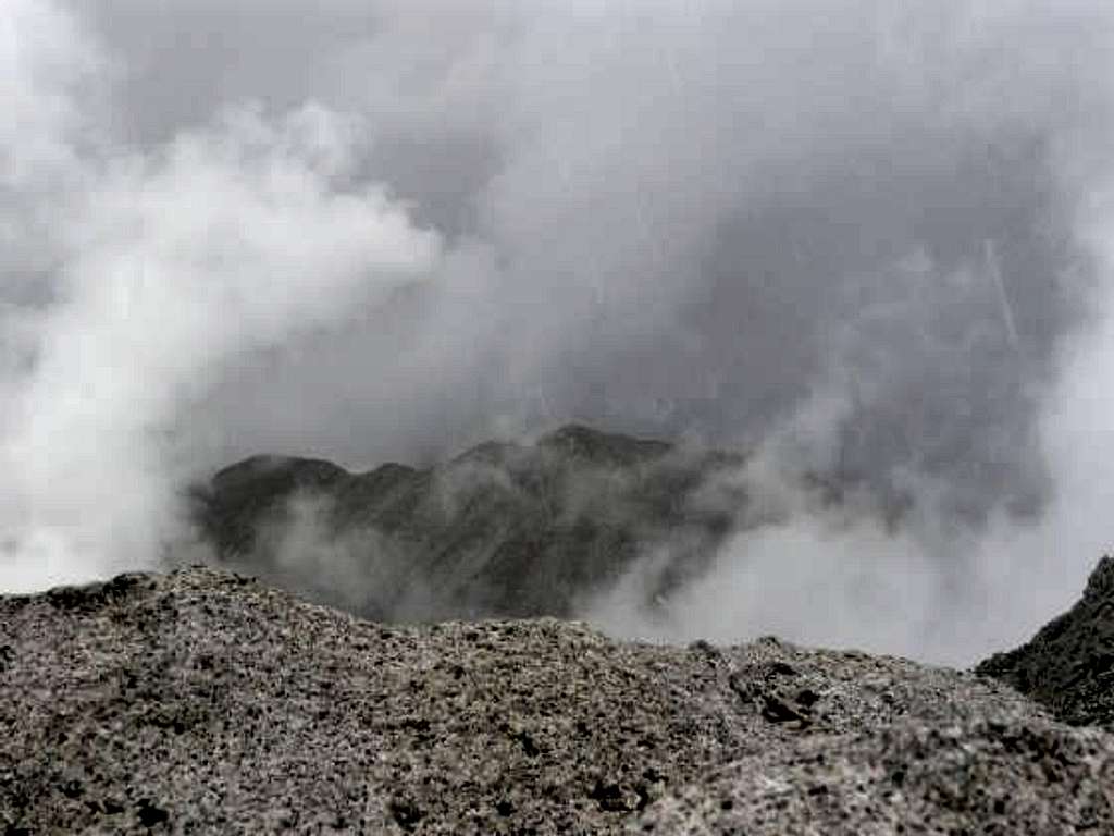 The summit of Tabeguache, visible briefly through the clouds