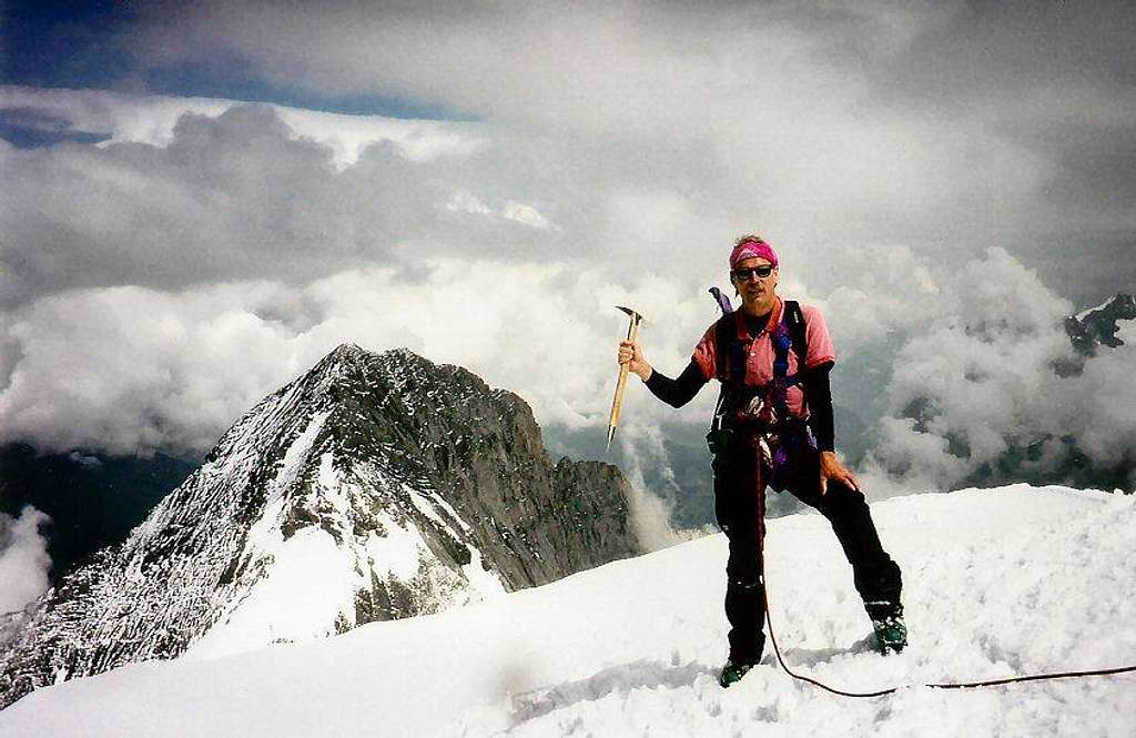 Hans on the summit with Eiger behind