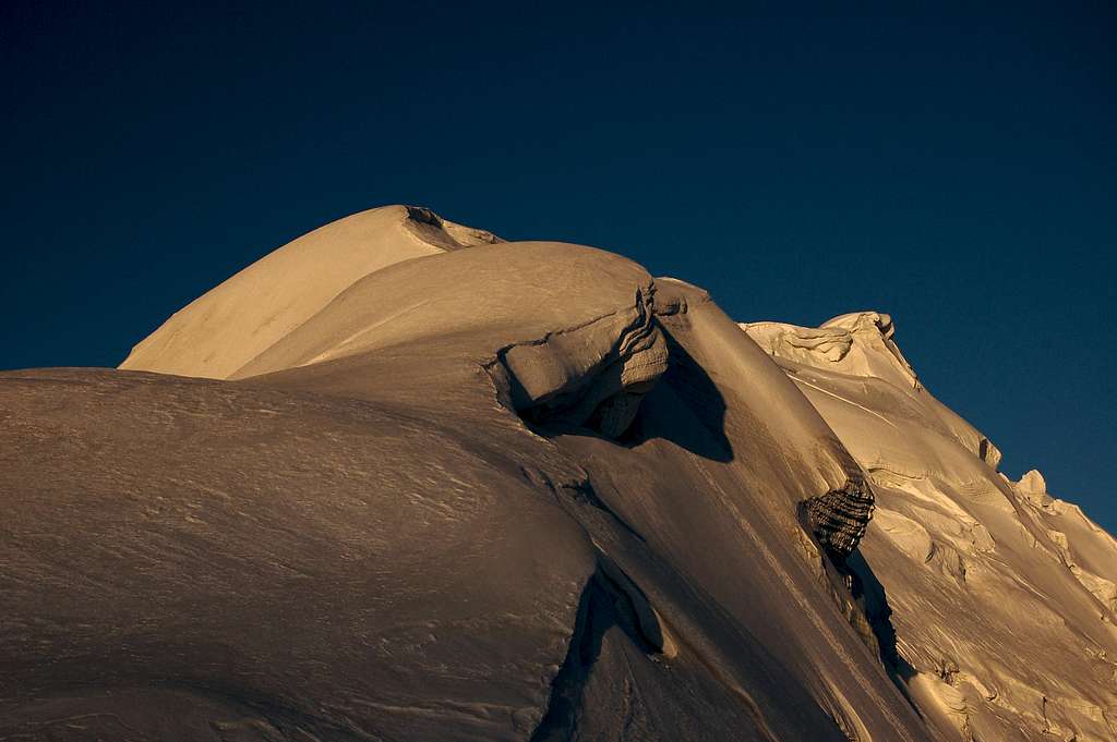 Sunrise over Yazghil Sar's northern ridge