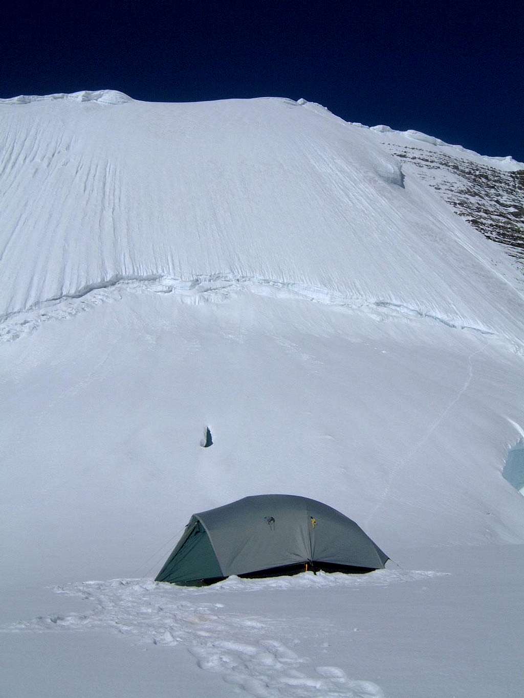 High camp on the Dome at the base of the Kain Face