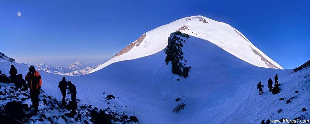 Climbing Mt. Elbrus on the saddle with Western Summit tower front view and all route arond 180 degrees...