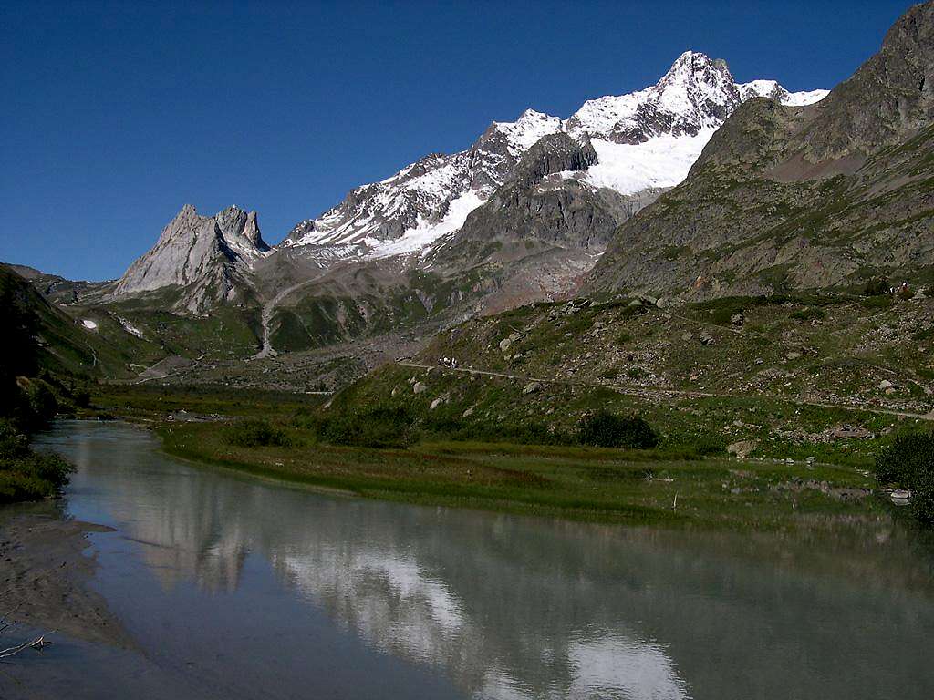 Pyramids Calcaires and Aiguille des Glaciers from the shore of Combal lake