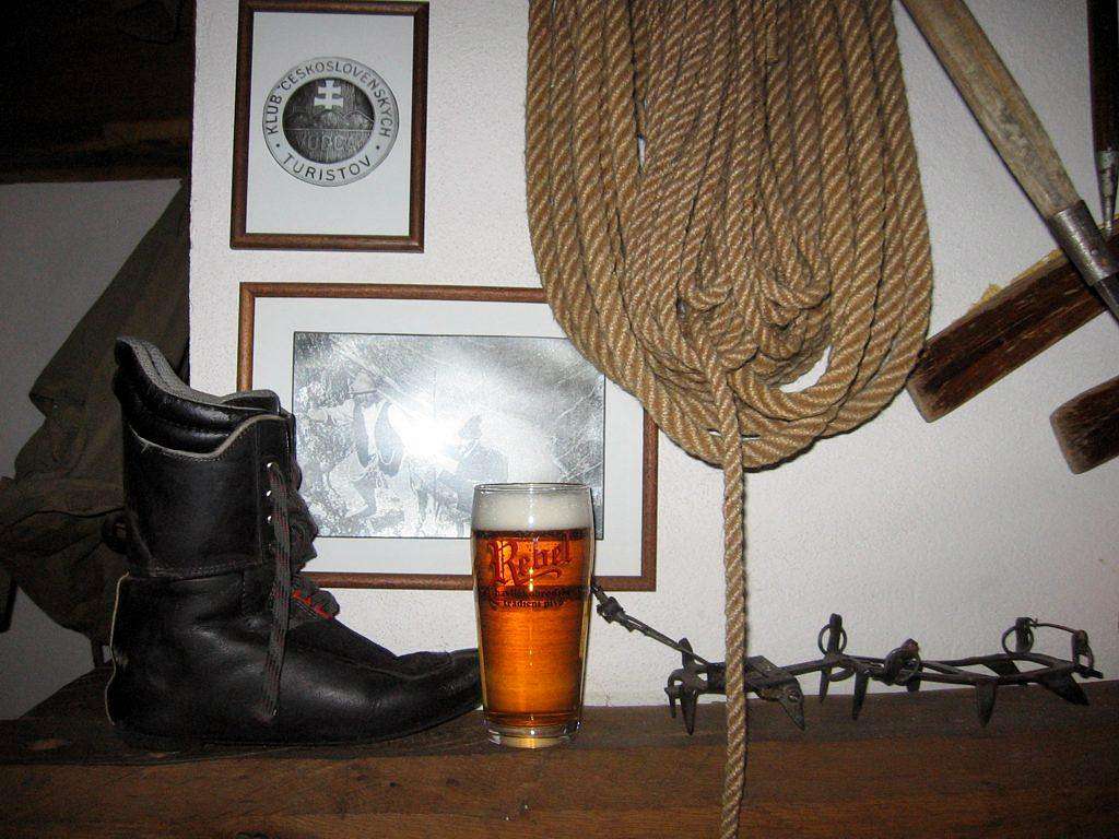 Ancient inner boot, crampon and Rebel beer