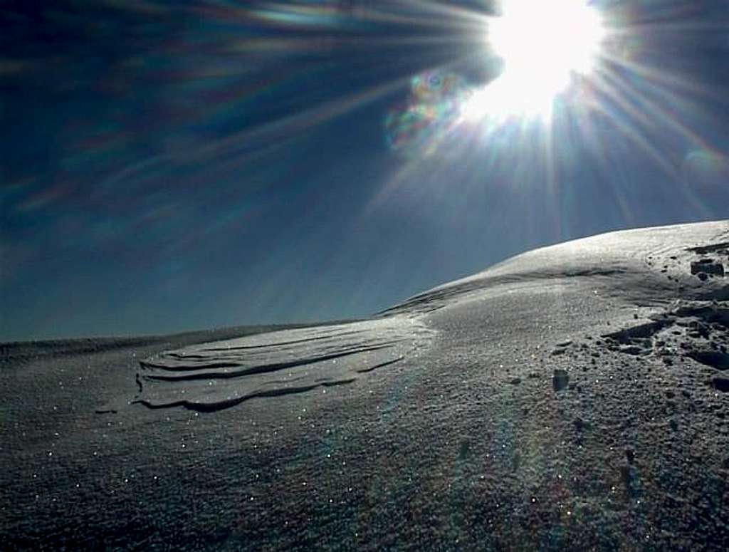 Snowdrift on summit cornice -...