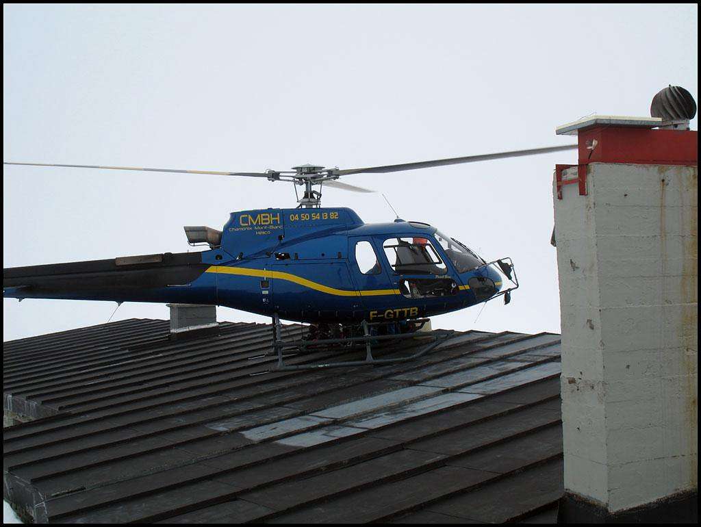 Helicopter landing on the roof.