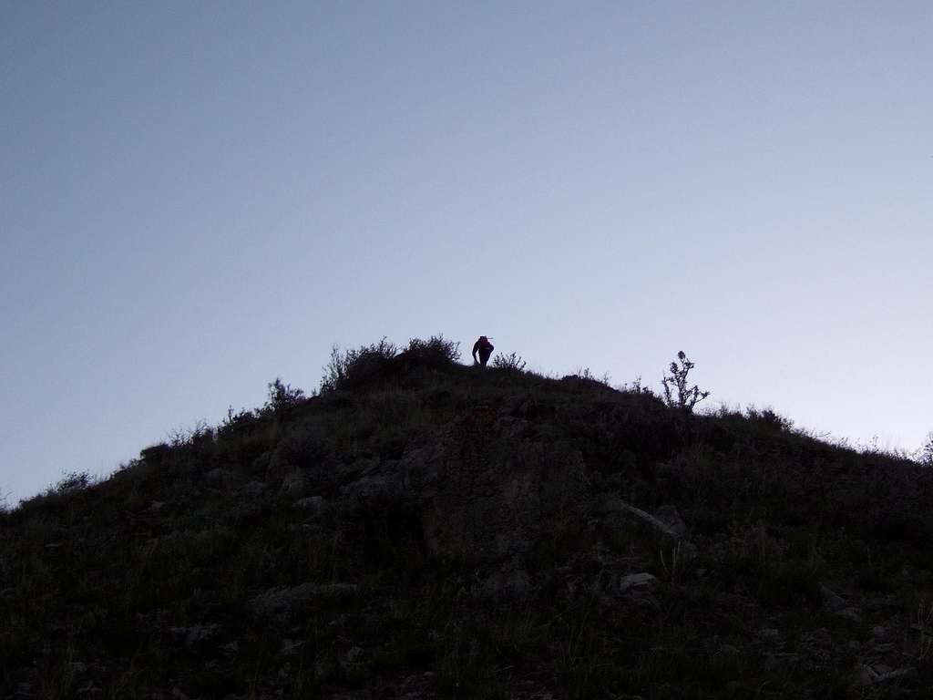 Kent cresting a ridge at dawn