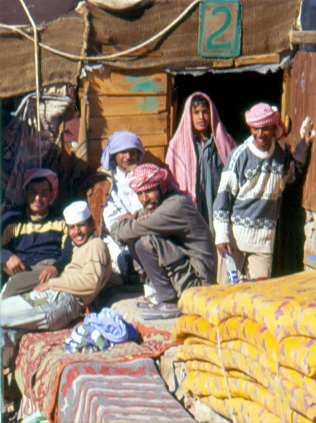 Bedouins in front of a guest hut