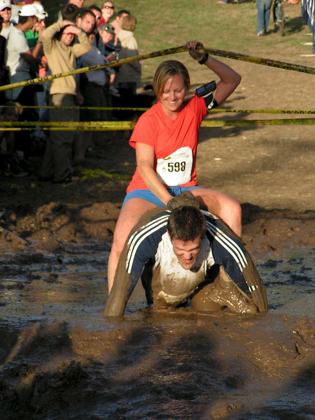 A woman avoids the mud the old fashion way. Vail, CO